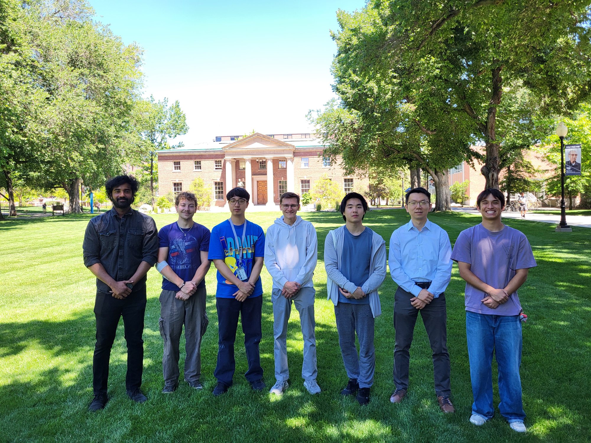 Chen Group members standing together on the University of Nevada, Reno campus