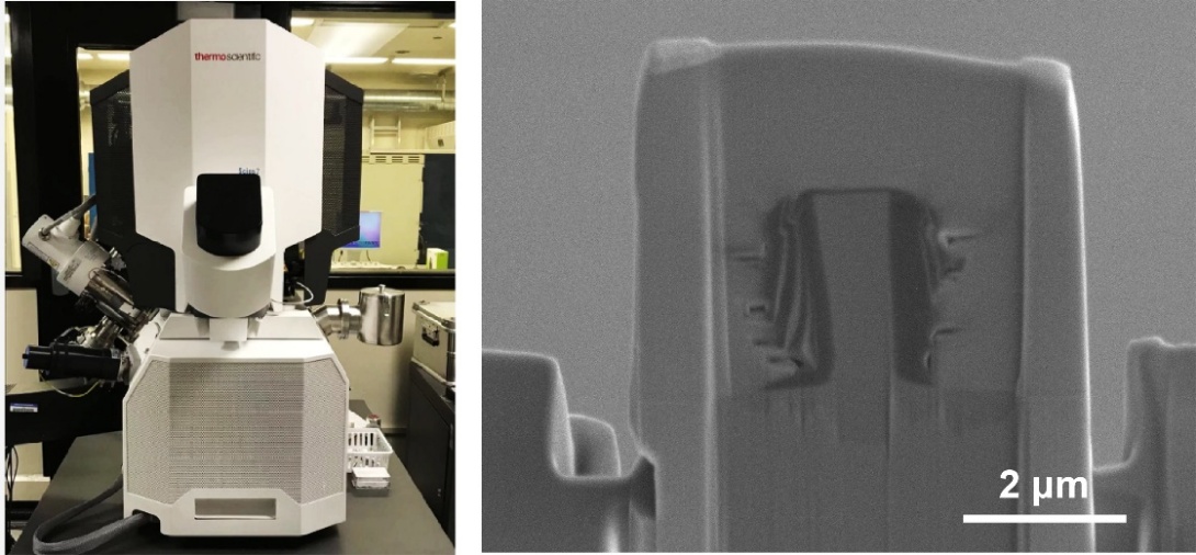 Dual-beam focused ion beam and scanning electron microscope beside a fabricated microscale specimen